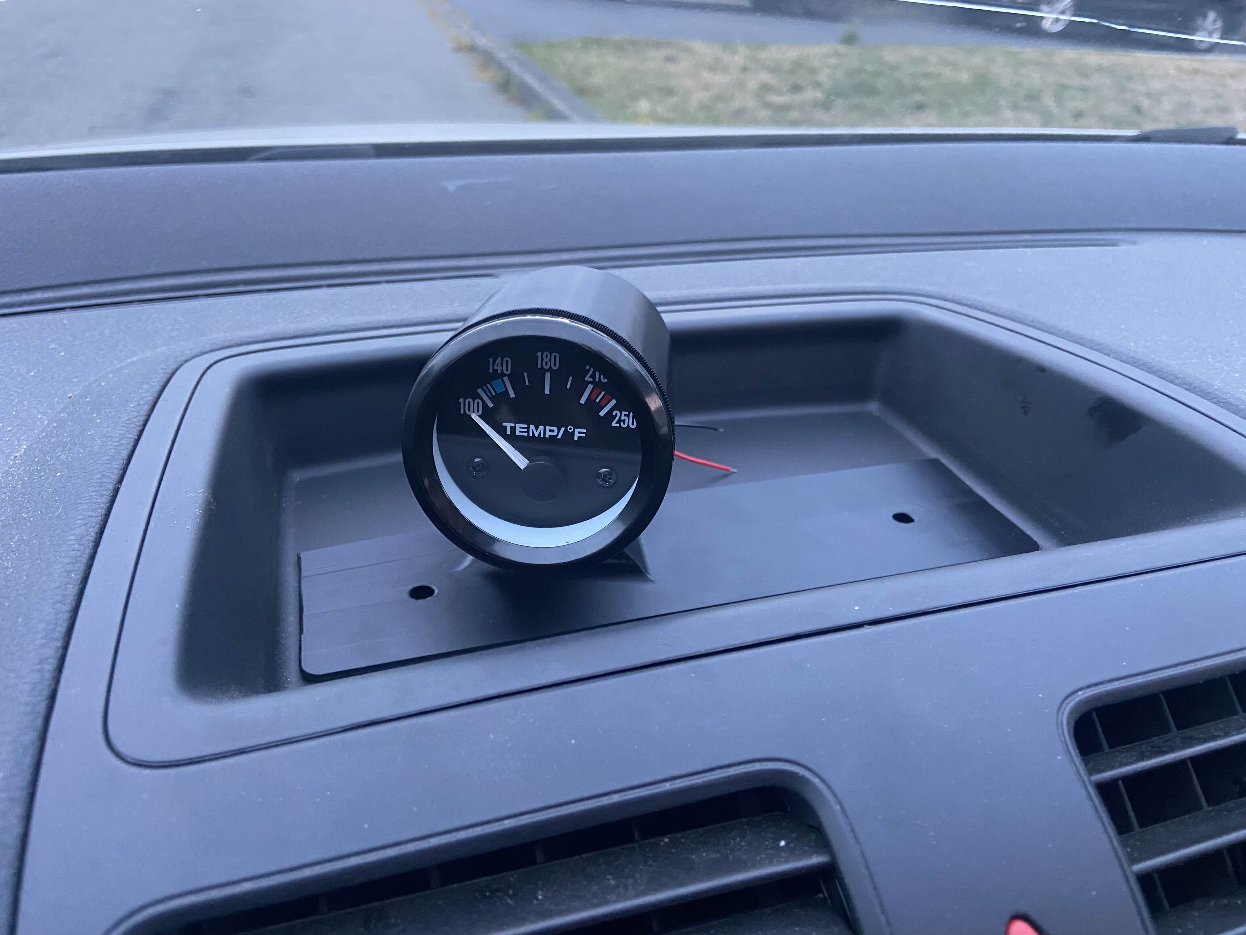 Volkswagen MK5 single center gauge pod mount installed in the center dashboard tray